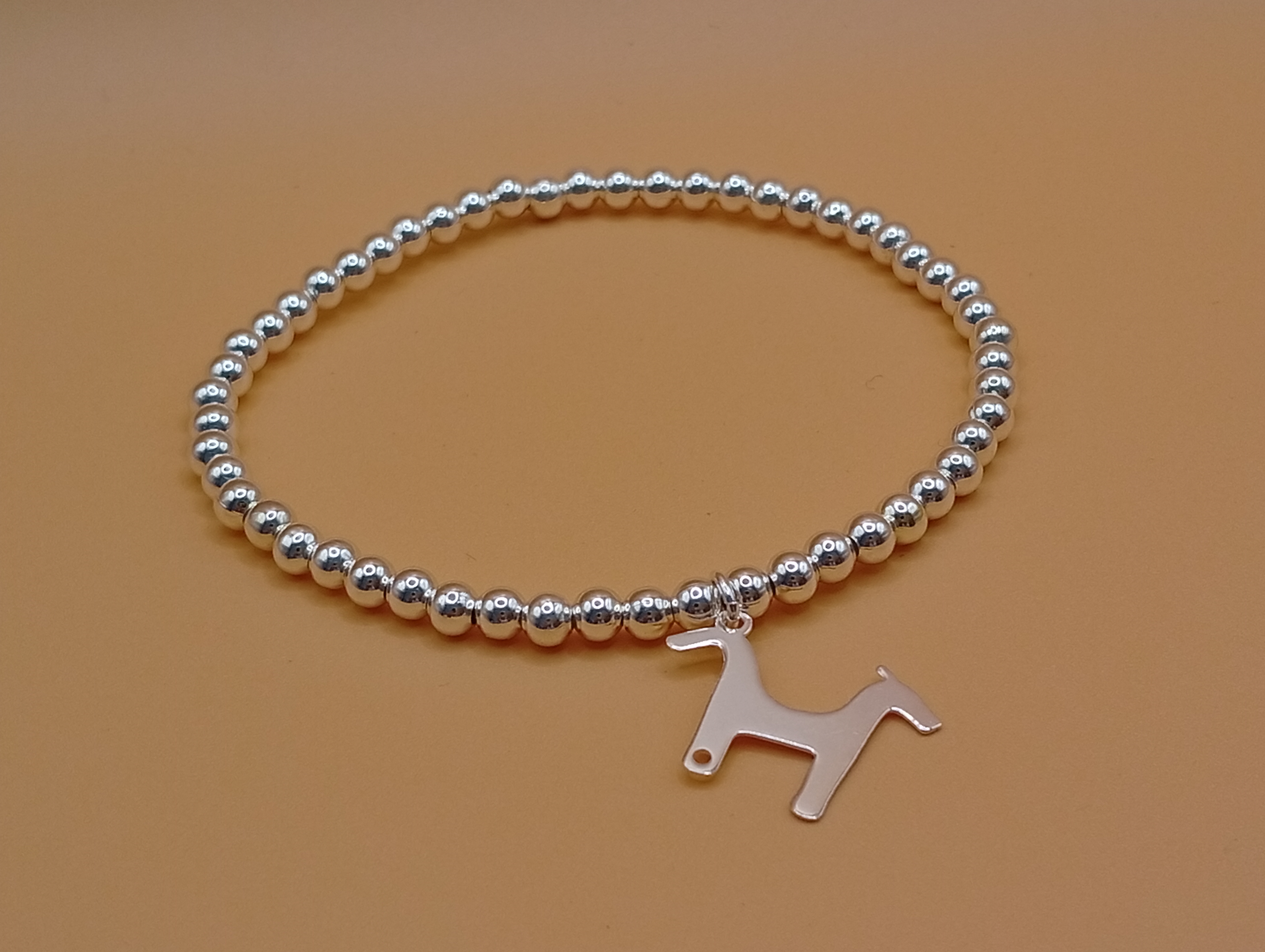 Imagen 4 de 4: Pulsera plata con diferentes colgantes